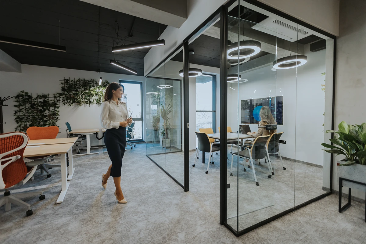 Businesswoman walking looking at serviced office